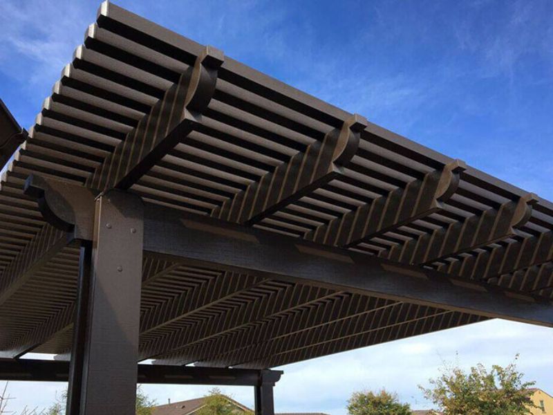 thiết kế mái che sân trước nhà ống