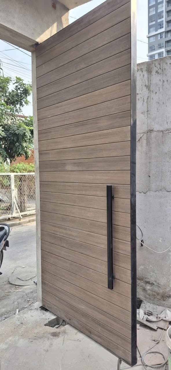 Cổng gỗ nhựa cánh lớn cho biệt thự